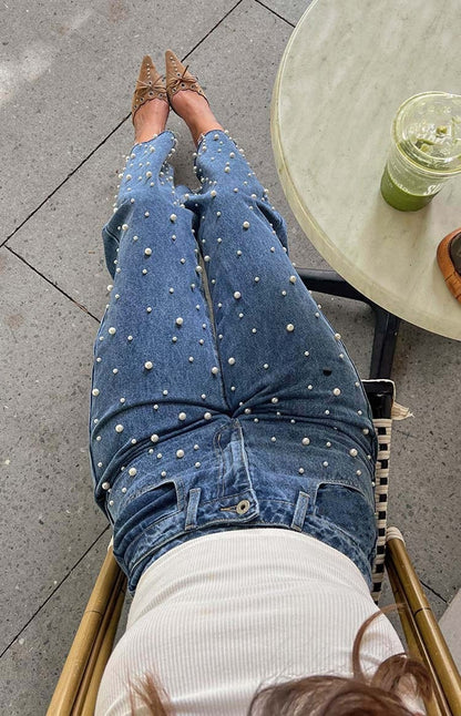 Jeans droits à taille oblique, perles croisées et ourlet effiloché